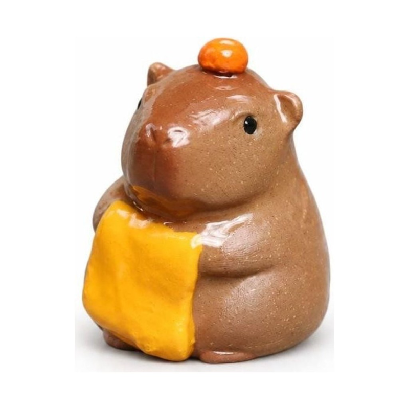 Capibara tea pet van paarse klei met litchimotief