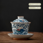 Chinese gaiwan van porselein met bloem of fruitmotief — Fruitgaiwan met schoteltje