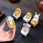 Chinese tea pet met badende dieren van Yixing-klei