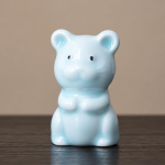 Dierlijke tea pet van blauw-wit porselein