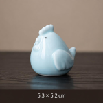 Dierlijke tea pet van blauw-wit porselein — Vogel met kuif