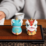 Duo Chinese leeuwenbeeldjes van hars