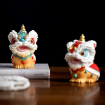 Duo Chinese leeuwenbeeldjes van hars