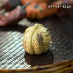 Fruitvormige tea pet van Yixing-klei — Crèmegele en lichtgroene aar
