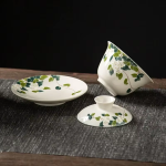 Gaiwan van porselein met bloem en landschapsdecor