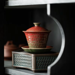 Gaiwan van rood porselein met gespikkeld glazuur