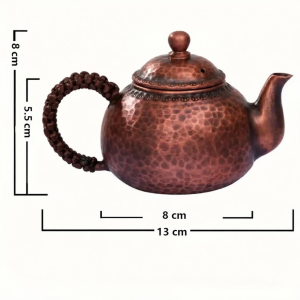 Gehamerde koperen theepot van puur koper