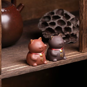 Gelukskat tea pet van paarse klei