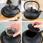 Gietijzeren waterketel met emaille en theezeef