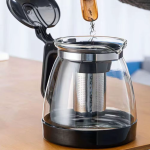 Glazen theepot met filter en geperforeerd mandje