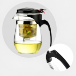 Glazen theepot met filter en kopjes