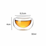 Glazen theepot met filter en kopjes — Kopje