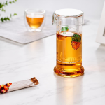 Glazen theepot met infuser en fruitdecor