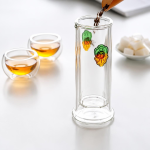 Glazen theepot met infuser en fruitdecor