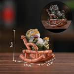 Gouden pad als tea pet van hars — Roestbruin