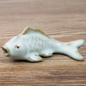 Karper tea pet van geglazuurd aardewerk
