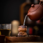Keramieken tea pet voor de theetafel