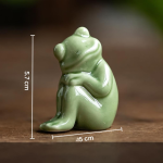 Kikker tea pet van celadonkeramiek — Poot vooruit