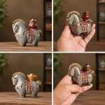 Kleurveranderende tea pet in de vorm van een paard