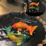 Kleurveranderende tea pet vissen van hars — Oranje en turquoise duo