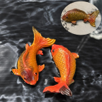 Koi-theefiguur van hars met kleurverandering — Duo oranje en donkerrood