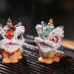 Leeuwendans tea pet van hars