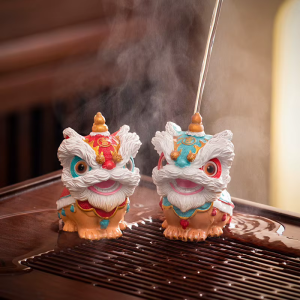 Leeuwendans tea pet van hars — Set van 2