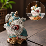 Leeuwendans tea pet van hars — Turquoise