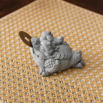 Pad als feng shui tea pet met drakenkop