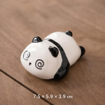 Pandabeer tea pet van keramiek — Liggend, spiraalvormige ogen