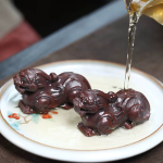 Pixiu tea pet met reliëfkrullen