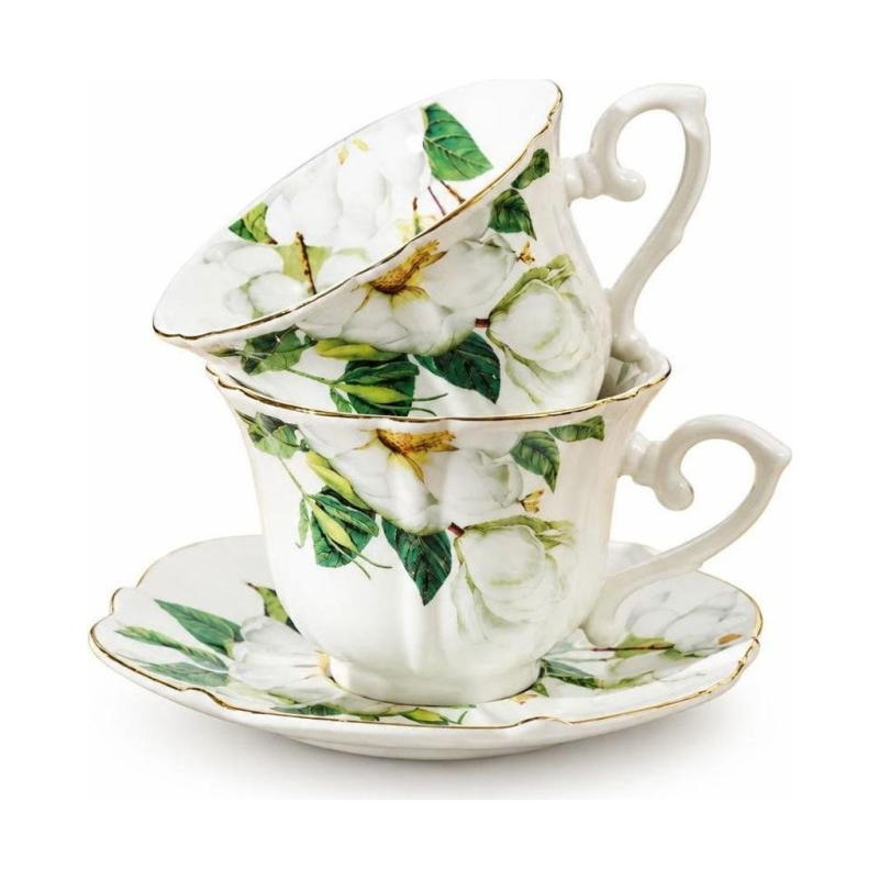 Porseleinen koffiekopje met schotel en camelliadecor