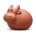 Porseleinen tea pet met koe voor theeblad
