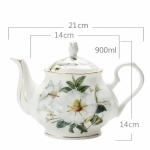 Porseleinen theepot met bloemen en filter