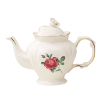Porseleinen theepot met bloemen en retrodecor