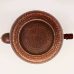 Retro koperen theepot met hamerslag
