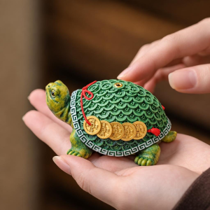 Schildpad tea pet van hars met geluksmotief