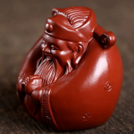 Tea pet god van het geluk in Yixing-klei