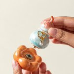 Tea pet in kalebasvorm met kristalglazuur