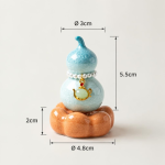Tea pet in kalebasvorm met kristalglazuur — Turquoise, oranje voetstuk