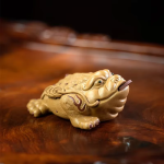 Tea pet in padvorm van paarse klei, handgemaakt