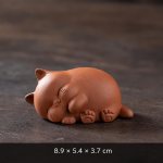 Tea pet kat in vijf houdingen — Liggend