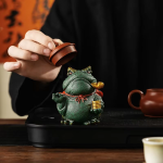 Tea pet kikker van paarse klei
