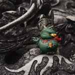 Tea pet kikker van paarse klei