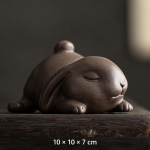 Tea pet konijn van paarse klei — Liggend