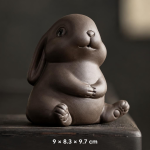 Tea pet konijn van paarse klei — Zittend met open ogen