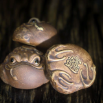 Tea pet met drie poten als gelukskikker