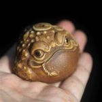 Tea pet met drie poten als gelukskikker