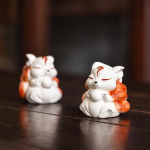 Tea pet met negenstaartige vos