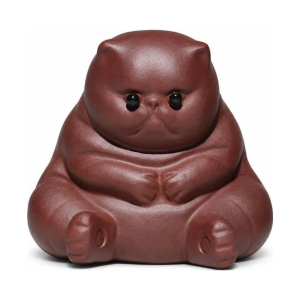 Tea pet van paarse klei in kattenvorm